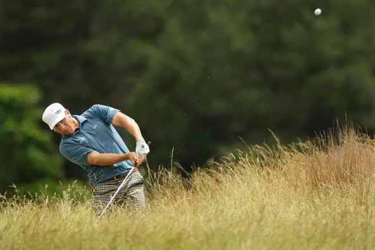 Ricky Barnes hits out of the rough on the 10th fairway, on his way to a one-shot lead after the third round.