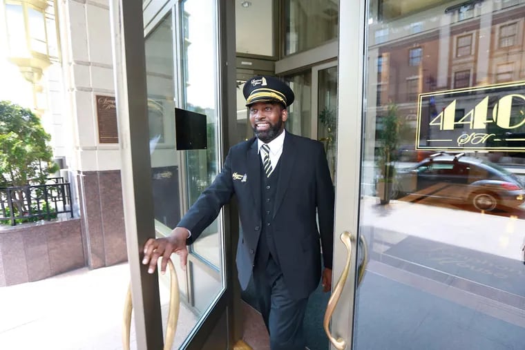 Andrew Monroe (above) is the doorman at Symphony House on South Broad Street. Buyers pick condos because of the convenience of one-level living, and the security of a doorman.