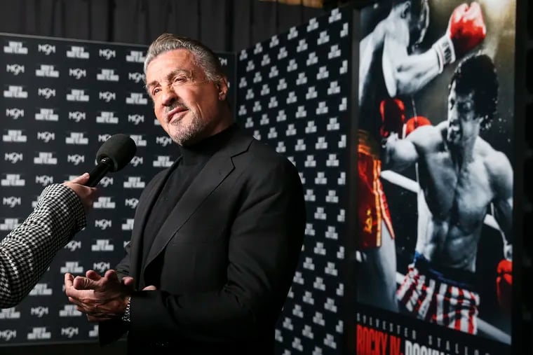 Rocky film star Sylvester Stallone talks with reporters at a premiere for the director's cut of "Rocky IV" on Nov. 11, 2021. Stallone will appear in Philly again at the new Rocky Shop on Dec. 3, 2023 for the declaration of the city's first-ever 'Rocky Day."