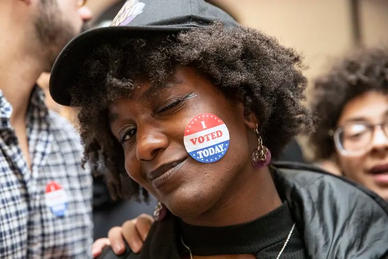Liyanni Smith, 18, of West Philly, wears her "I voted today" sticker on her face at a results watch party for the Working Families in North Philadelphia on Nov. 05, 2019. The Party saw a historic win for a City Council at-large seat by Kendra Brooks, who represents another political trend: more women running for office.
