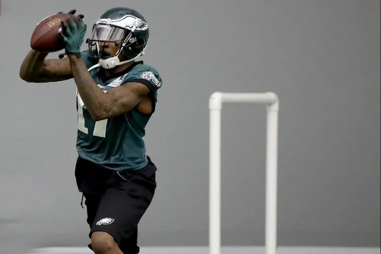 Eaglesâ€™ Alshon Jeffery catches a pass during Eagles practice in Philadelphia, PA on January 10, 2018. The Eagles are preparing for the playoff game against the Falcons. DAVID MAIALETTI / Staff Photographer
