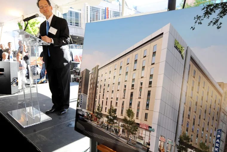 Robert Zuritsky, president and CEO of Parkway Corp., describes the Home2Suites hotel his company developed in 2018. "It wasn't an easy project," Zuritsky said. This year his company raised $100 million from investors to turn more surface parking lots into commercial building projects.