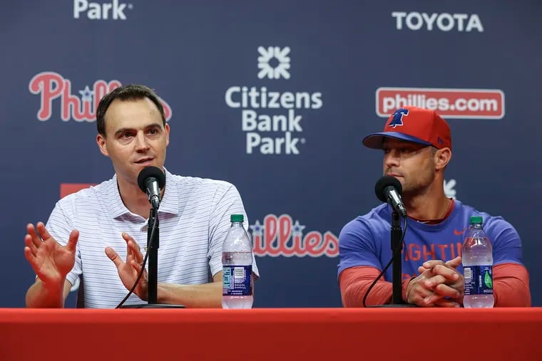 General manager Matt Klentak left,  and manager Gabe Kapler during a press conference in August.