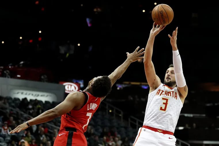 Marco Belinelli,, then with the Hawks, shooting over the Raptors' Kyle Lowry on Jan. 24.