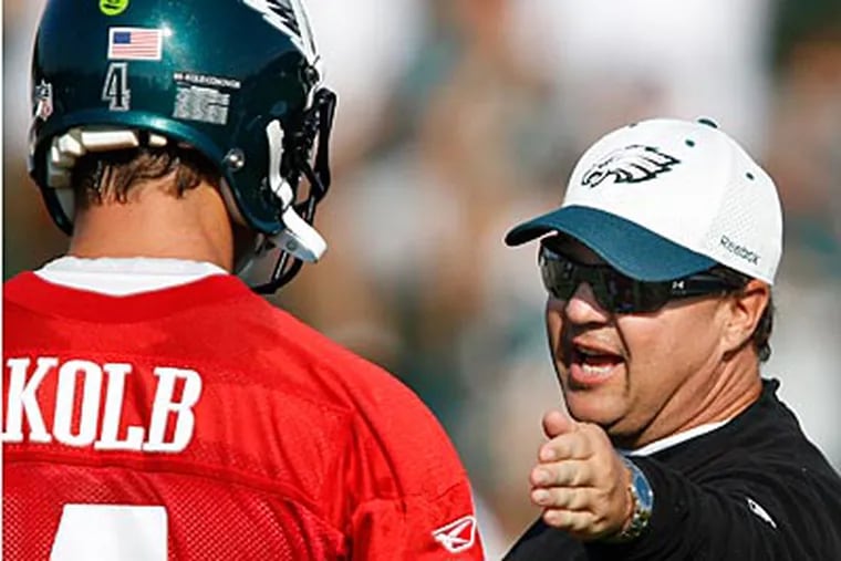 Marty Mornhinweg and Andy Reid expect to see improvement from Kevin Kolb Friday against Cincinnati. (David Maialetti / Staff Photographer)