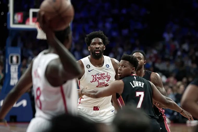 Kyle Lowry covers Sixers Joel Embiid who is looking to Sixers# 18 Shake Milton for an inbounds pass in the second half the Miami Heat at the Philadelphia 76ers NBA game at the Wells Fargo Center on Thursday.