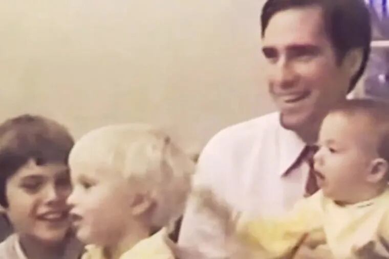 Republican presidential candidate Mitt Romney with his children in a screen grab from his current campaign commercial.