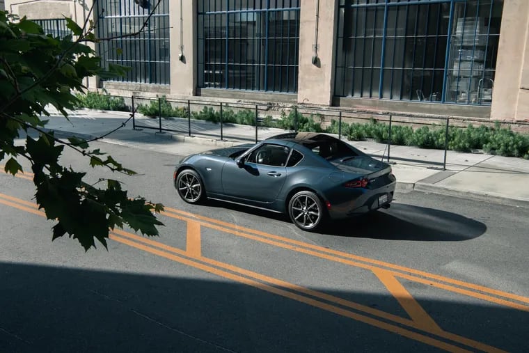 The 2020 Mazda MX-5 Miata RF features a retractable hardtop, making rainy days almost as much fun as sunny ones. But the closed rear window compartment does change the top-down feel.
