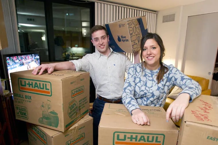 Anthony Pell and Halley Yankanich are getting ready to move out of their apartment at The Piazza at Schmidt to a nearby home they are purchasing. ( CHARLES FOX / Staff Photographer )