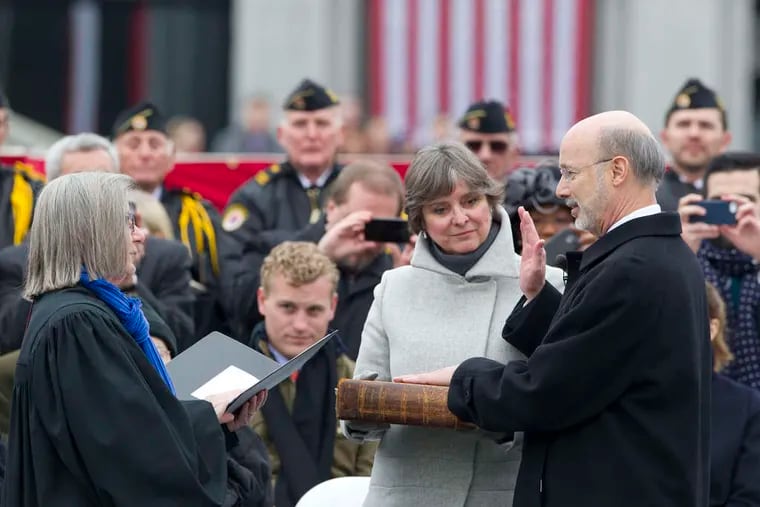 Tom Wolf is sworn in as Pennsylvania governor by Judge Penny Blackwell. Wolf's wife, Frances, was by his side. "I am an unconventional governor," Wolf proclaimed, although he has been a Pa. official before.