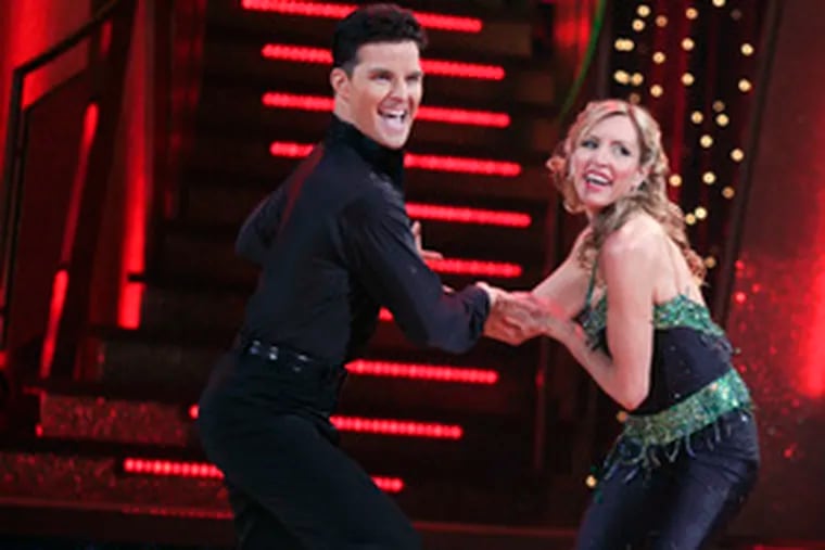 On &quot;Dancing With the Stars&quot; Monday, Jonathan Roberts quickstepped and Heather Mills mamboed - and flipped.