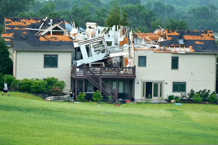 A destroyed home sits in a neighborhood after it was hit by a tornado on Tuesday, May 28, 2019, south of Lawrence, Kan., near US-59 highway and N. 1000 Road. The past couple of weeks have seen unusually high tornado activity in the U.S., with no immediate end to the pattern in sight.