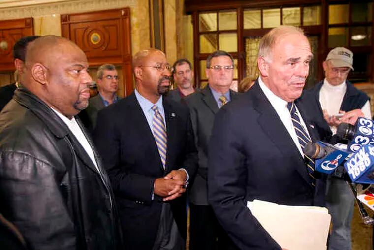 Gov. Rendell (right) with Mayor Nutter (center) and TWU leader Willie Brown (left) announce the end of the transit strike early today in a gathering at the Bellevue.