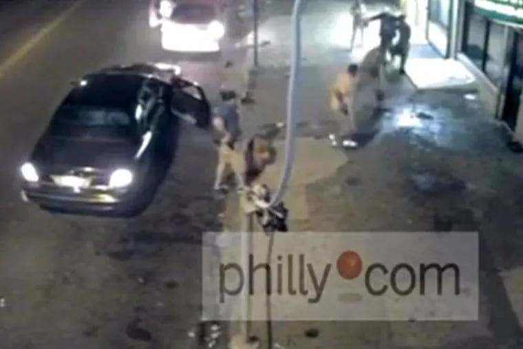 Surveillance video from the night an undercover Philadelphia police officer shot and killed Mike Berry. (Philly.com video)