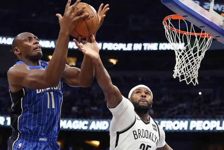 The Philadelphia 76ers acquired Trevor Booker (right) in a trade with the Brooklyn Nets that sent Jahlil Okafor and Nik Stauskas to Brooklyn.