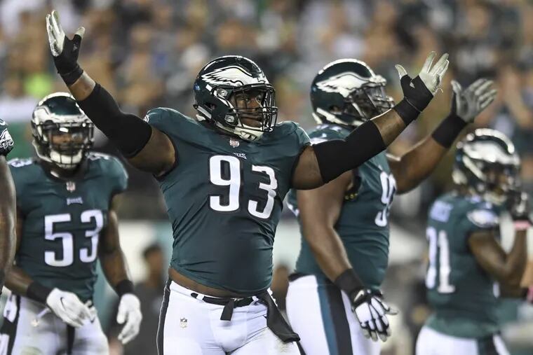 Eagles defensive tackle Tim Jernigan encourages the crowd during the team’s victory over Washington on Monday night.