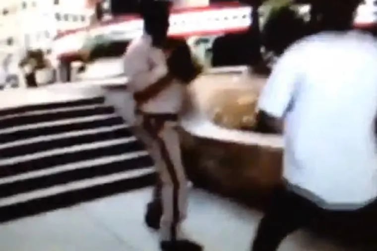 Love Park ranger Erron Williams testified in court last week that he did nothing to provoke a skateboarder's violent attack on him last month. But a new video has emerged that raises questions about the ranger's recollection of the incident. (Still from an enjoygram.com video)