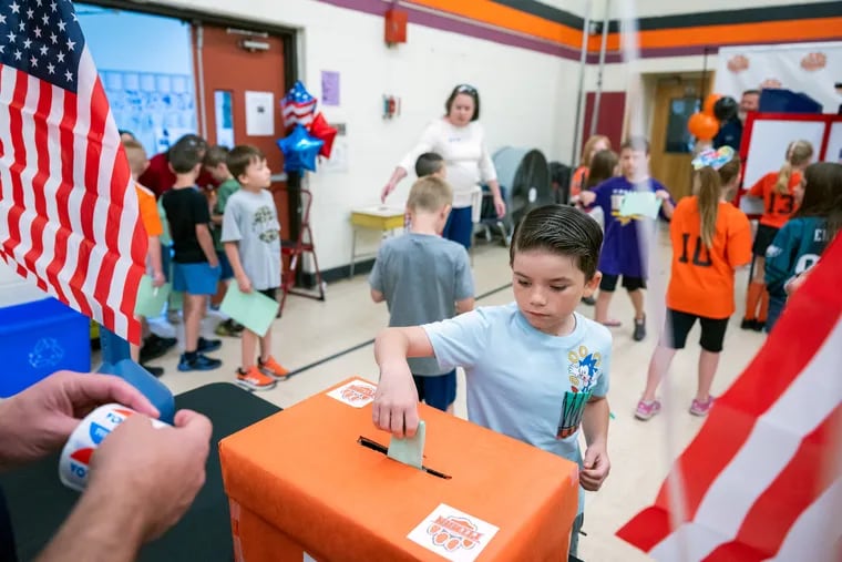 Students cast ballots for a new school name Tuesday, June 6, 2023 at W.C.K. Walls Elementary in Pitman, NJ.