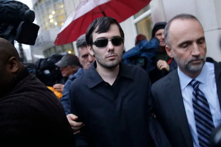 Martin Shkreli leaving the courthouse after his arraignment in New York. He was vilified for a huge boost in the price of a drug.