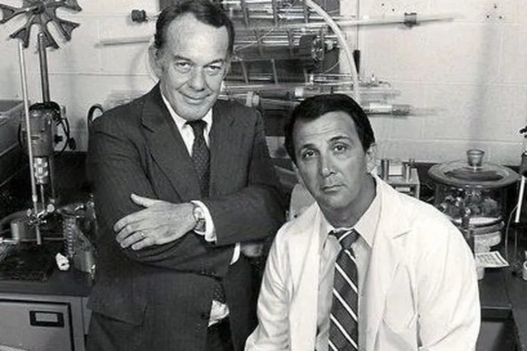 Dr. Liberti (right), with Wharton School dean Don Carroll in 1984, "had the capacity to take in complex things, understand them, and make them understandable to others,” a son said.