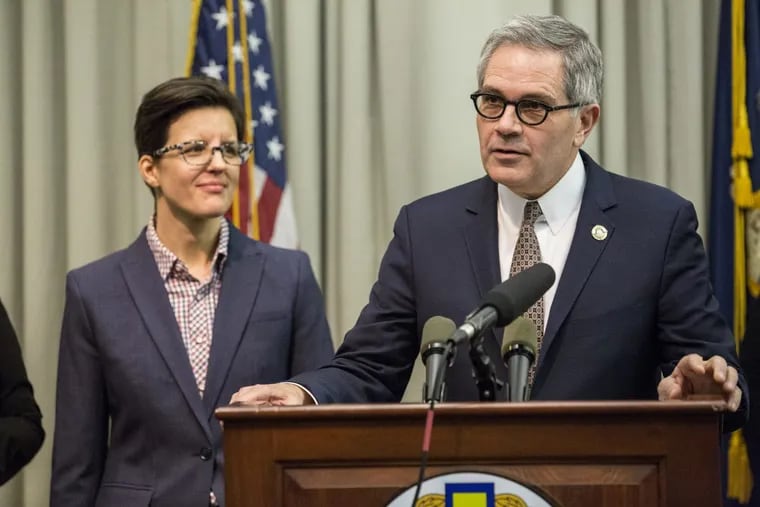 DA Larry Krasner, right, announces the hiring of Caleb Arnold, left, who will fills a new position in the District Attorney’s Office which will focus on protecting the rights of immigrants interacting within the criminal justice system and the Philadelphia District Attorney’s Office, in Philadelphia, Thursday, Jan. 25, 2018.