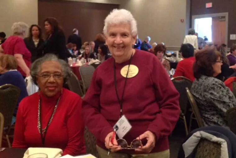 Ethel Malone (left) and Ada Bello, volunteers with Center in the Park, at a statewide meeting. Ombudsmen can help patients and their families navigate care options for the elderly.