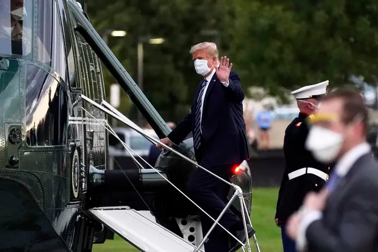 President Donald Trump boards Marine One to return to the White House on Monday.