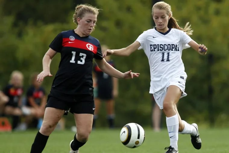 Germantown Academy’s Emily Williams (left) and Episcopal Academy’s Raina Kuzemka fight for ball control in the second half of a high school girls soccer game Sept. 20.