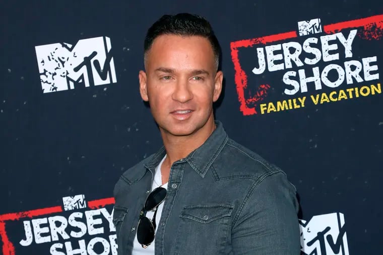 FILE - In this March 29, 2018 file photo, Mike "The Situation" Sorrentino arrives at the "Jersey Shore Family Vacation" premiere in Los Angeles. Sorrentino has regained his freedom.