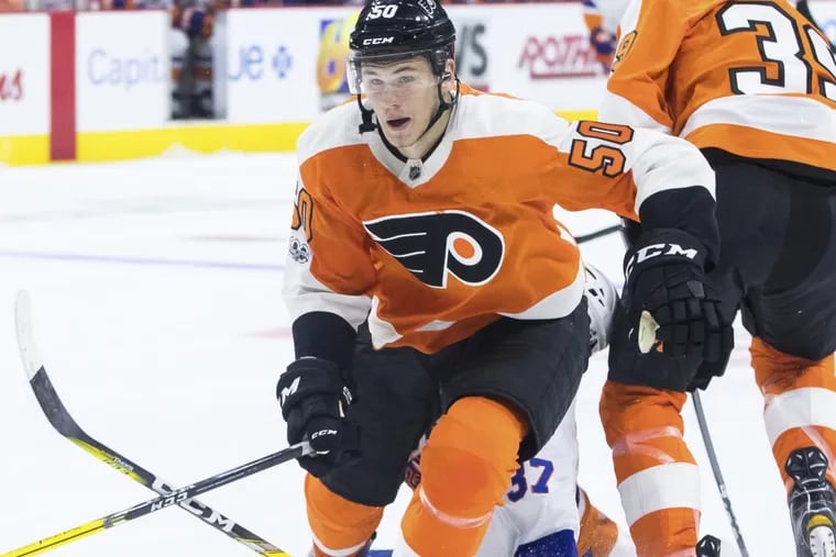 Samuel Morin, shown in a preseason game, and Travis Sanheim are both hoping to stay with the Flyers.