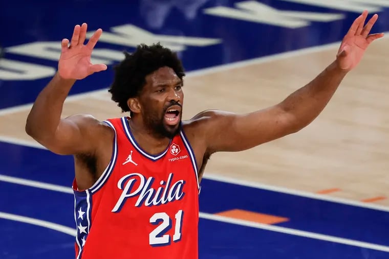 Center Joel Embiid yells to his Sixers teammates during Game 2 against the New York Knicks at Madison Square Garden.