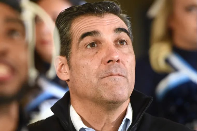 Jay Wright watches to learn the identity of the teams that will be playing Villanova when the NCAA tournament begins.
