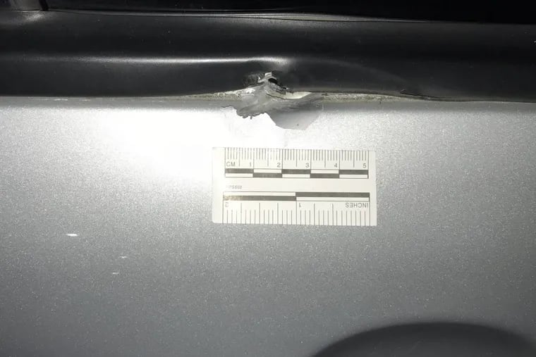 A bullet hole left in a vehicle after a suspected road-rage-induced shooting Monday evening in Bucks County.
