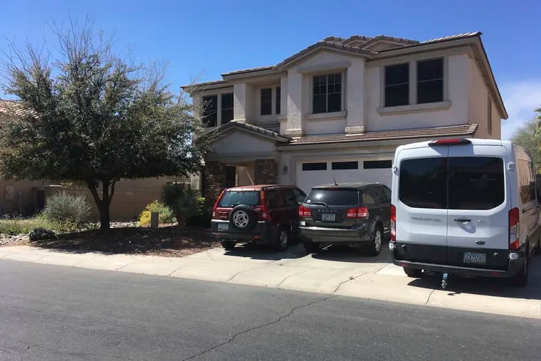 The home of Machelle Hobson in Maricopa, Ariz., is pictured on Wednesday, March 20, 2019. Hobson, 48, who operates a popular YouTube channel aimed at kids, is facing allegations she used pepper spray to discipline her seven adopted children and locked them for days inside a closet.