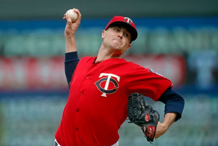 Minnesota Twins Mike Morin throws against the Tampa Bay Rays in a baseball game Thursday, June 27, 2019, in Minneapolis.