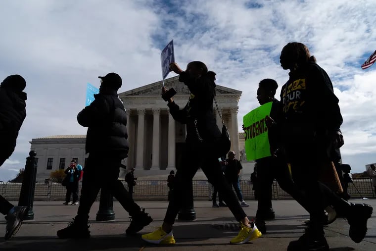 Supporters march during a rally in support of affirmative action policies outside the U.S. Supreme Court in Washington on Oct. 31.