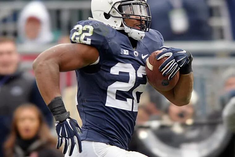 Penn State's Akeel Lynch rushes for a touchdown in the second half of
against Temple in an NCAA college football game, Saturday, Nov. 15. 2014, at Beaver Stadium in State College, Pa.Penn State won 30-13. (AP Photo/York Daily Record, Chris Dunn)