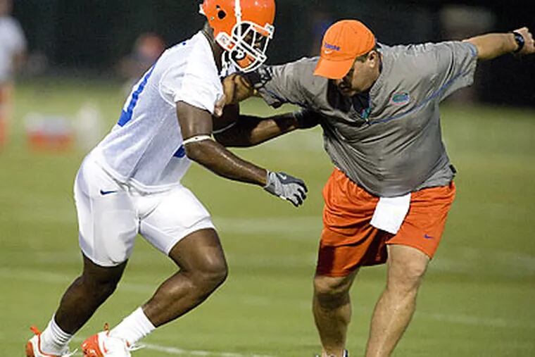 Chuck Heater has worked at eight FBS schools, most recently the University of Florida. (Phil Sandlin/AP file photo)