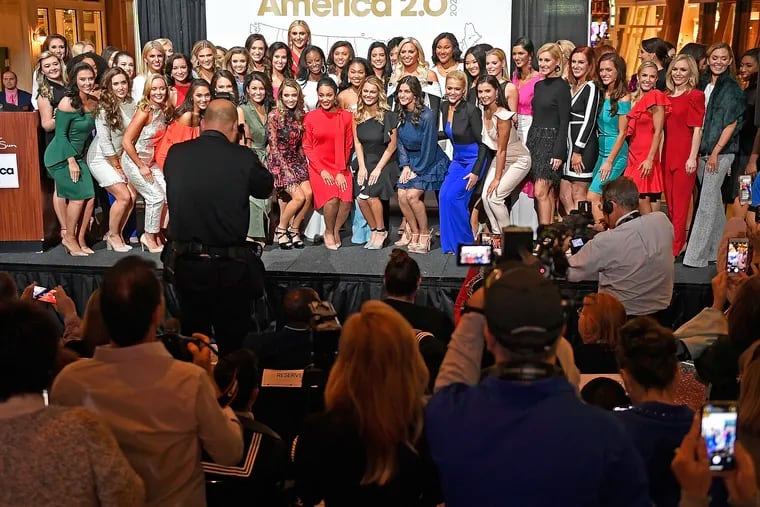 FILE - In this Thursday, Dec. 12, 2019, file photo, candidates for Miss America 2020 pose for a group photo during the official Arrival Ceremony for the Miss America 2.0 competition at Mohegan Sun. Miss America will be crowned for the first time at a tribal casino in Connecticut  on Thursday, Dec. 19, 2019. (Sean D. Elliot/The Day via AP, File)