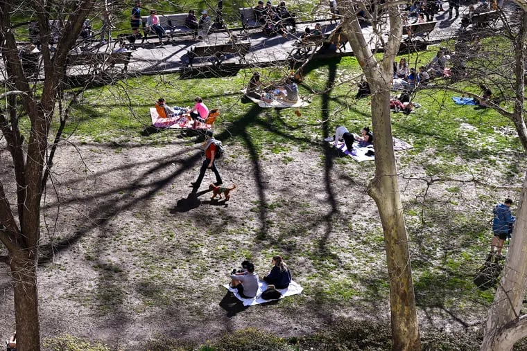 The lawn at Rittenhouse Square saw intense use during the pandemic. Over the next four years, it will be renovated or replaced.