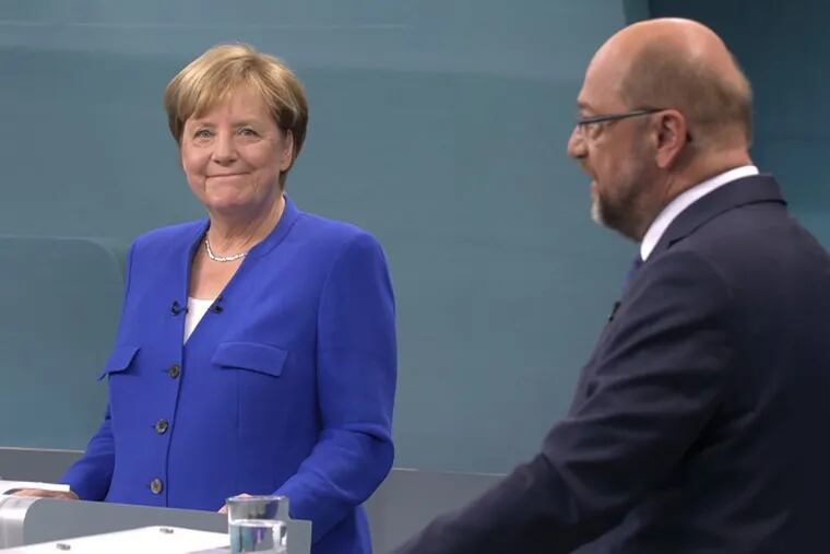 German Chancellor Angela Merkel and challenger Martin Schulz debate.