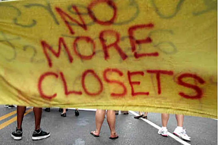A banner on Market Street during Philadelphia's 22d annual Gay Pride Parade. (Elizabeth Robertson / Staff)