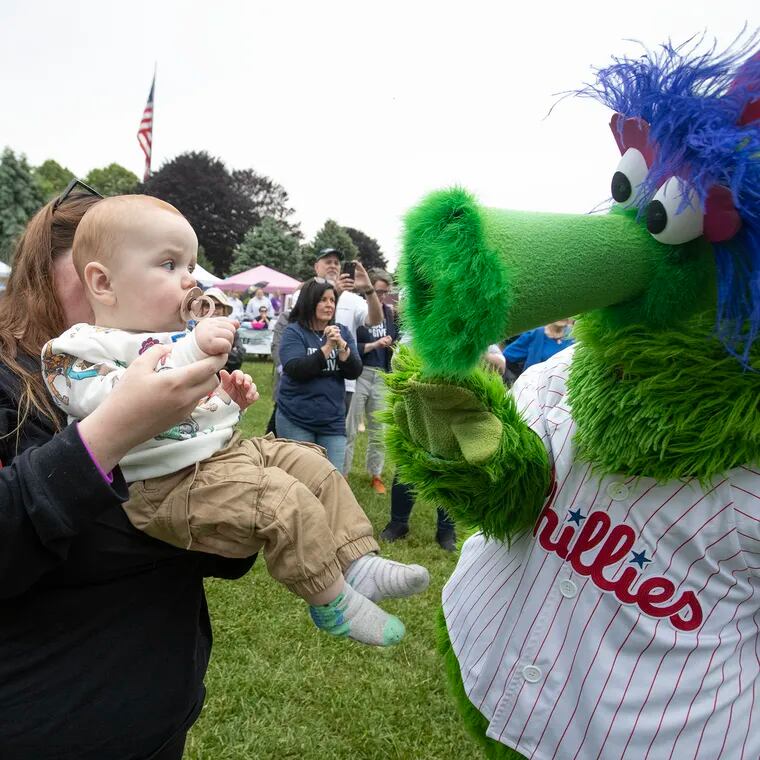 Dawson Dorwart, 10 months, comes face to face with the Phillie Phanatic. Delaware County is hosting a 24-hour giving day, Delco Gives Day, this week May 8 through May 9. It is the first community-wide giving day in the Philadelphia area. The end of the event is celebrated at Rose Tree Park in Media. 
