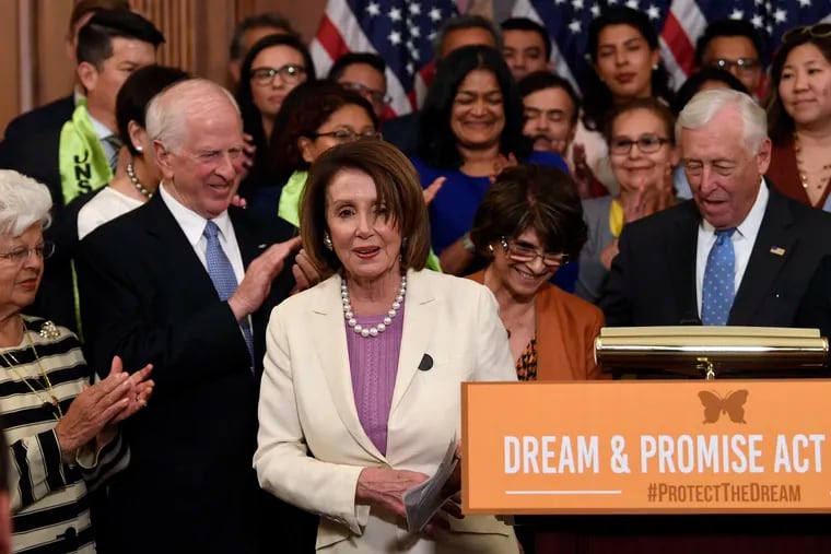 House Speaker Nancy Pelosi of Calif., center, is applauded after she spoke at an event on Capitol Hill in Washington, Tuesday, June 4, 2019, regarding the American Dream and Promise Act which offers a pathway to citizenship for those with Deferred Action for Childhood Arrivals (DACA), Temporary Protected Status (TPS), and Deferred Enforced Departure (DED) and similarly situated immigrants who have spent much of their lives in the United States.