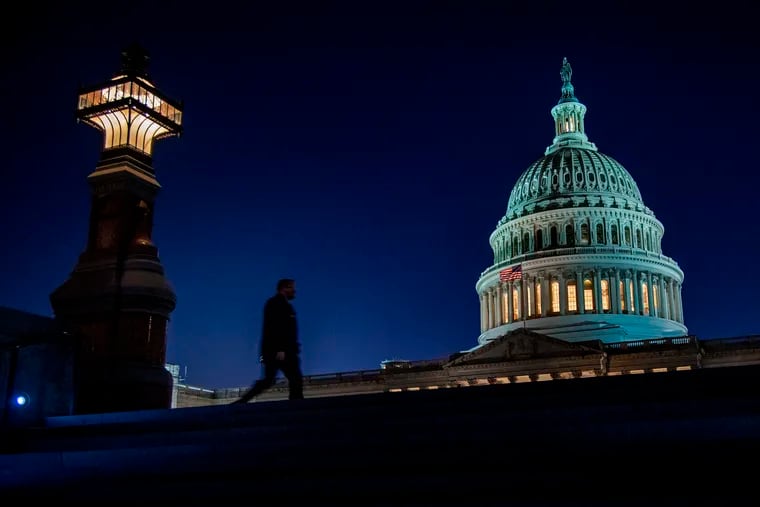 Darkness comes to the U.S. Capitol building Dec. 18, 2019, while Inside, the House of Representatives continues debate on the articles of impeachment against President Donald Trump.