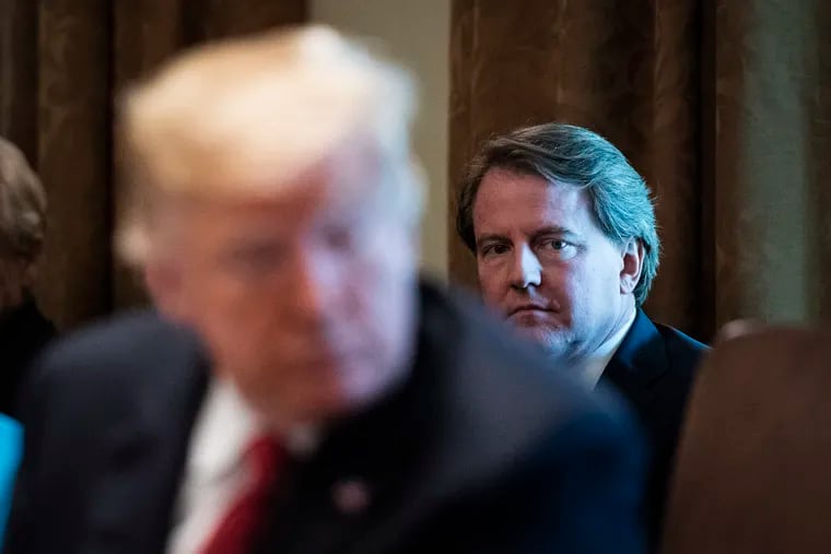 Then-White House counsel Don McGahn listens as President Donald Trump speaks during a Cabinet meeting in October 2018. MUST CREDIT: Washington Post photo by Jabin Botsford.