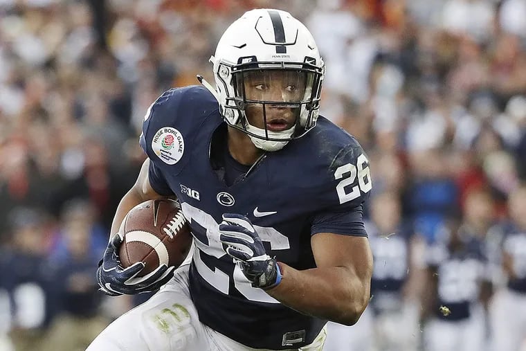 Penn State’s Saquon Barkley (26) looks for room to run against USC during the first half of the 2017 Rose Bowl.