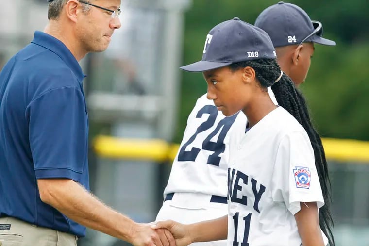 Taney coach Alex Rice would like to see more female baseball players like Mo'ne Davis (right). (Ron Cortes / Staff Photographer)