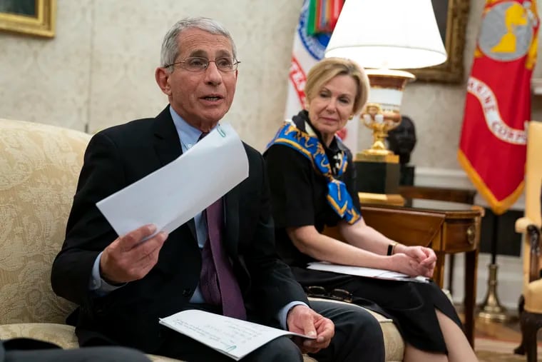 White House coronavirus response coordinator Dr. Deborah Birx listens as director of the National Institute of Allergy and Infectious Diseases Dr. Anthony Fauci speaks during a meeting between President Donald Trump and Gov. John Bel Edwards, D-La., about the coronavirus response, in the Oval Office of the White House, Wednesday, April 29, 2020, in Washington. (AP Photo/Evan Vucci)