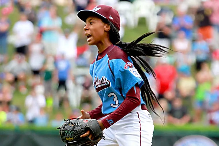 Taney Dragons' pitcher Mo'ne Davis celebrates a 4-0 win over Nashville at the Little League World Series in South Williamsport. (David Swanson/Staff Photographer)